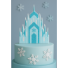 Light blue fondant cake topped with a shimmering Frozen-inspired castle made using Cuqui’s metal cutter.
